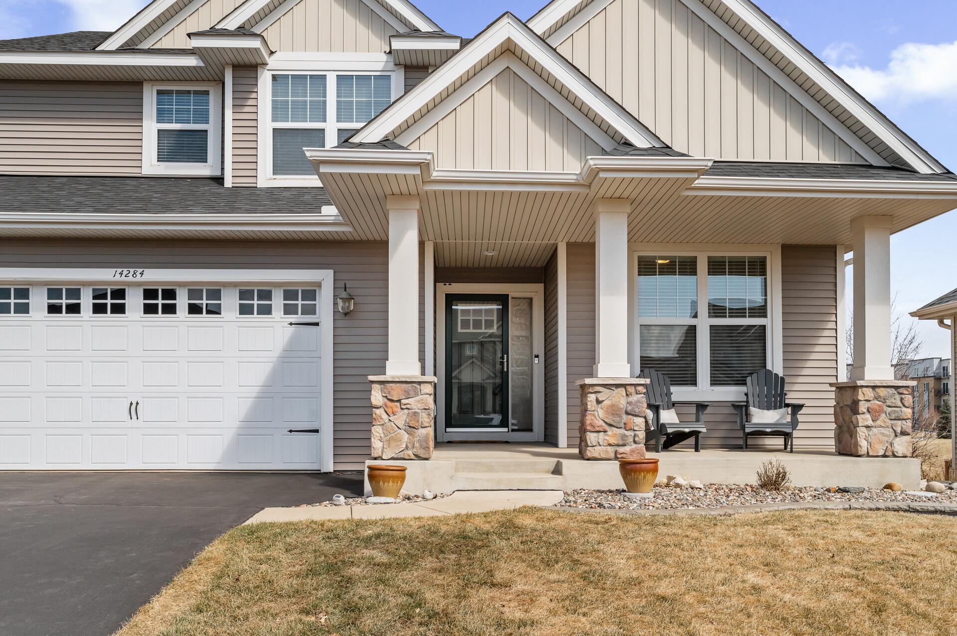 A charming front porch enhances this home's curb appeal.