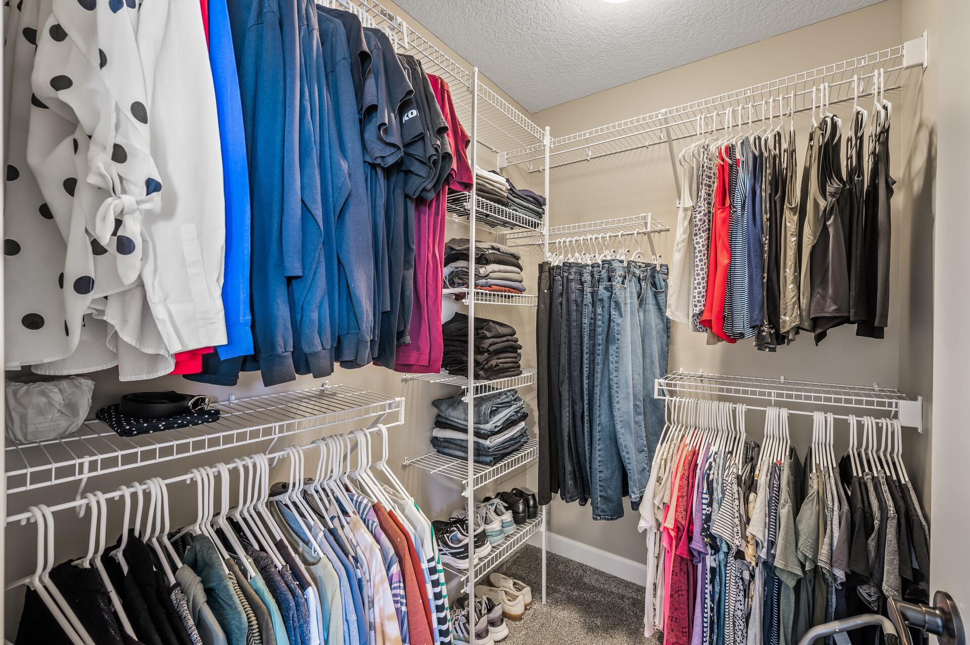 This space emphasizes tidiness with designated storage solutions for all your clothes.