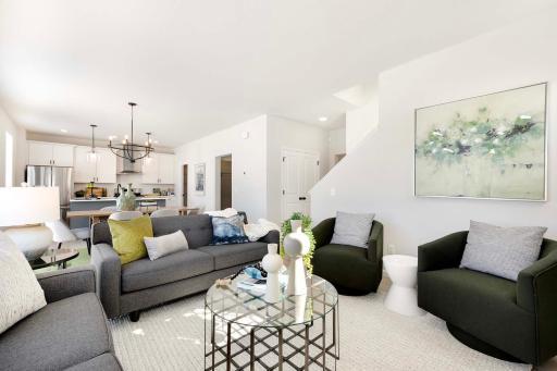The open-concept design of the home allows each room to naturally flow into the next, creating an expansive and airy feel. Photos are from previously built home; features and options will vary.