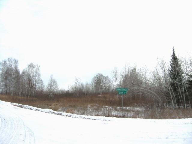 View of lot from corner - intersection of Tamarack Ranch Rd. and Sunray Loop.