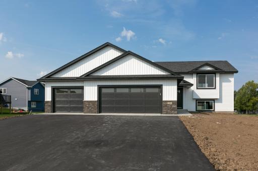 Photos are of a previously completed home with similar design and features. Actual selections, finishes, and materials may vary based on buyer choices and availability.