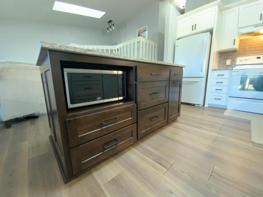 Gorgeous walnut hardwood island with granite!