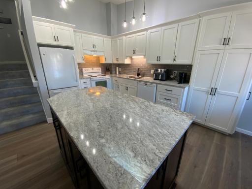 Large granite top island for all your entertainment.