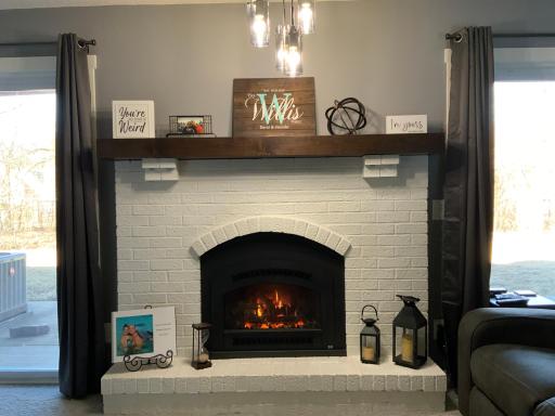 Brick fireplace for those cool spring and fall evenings!