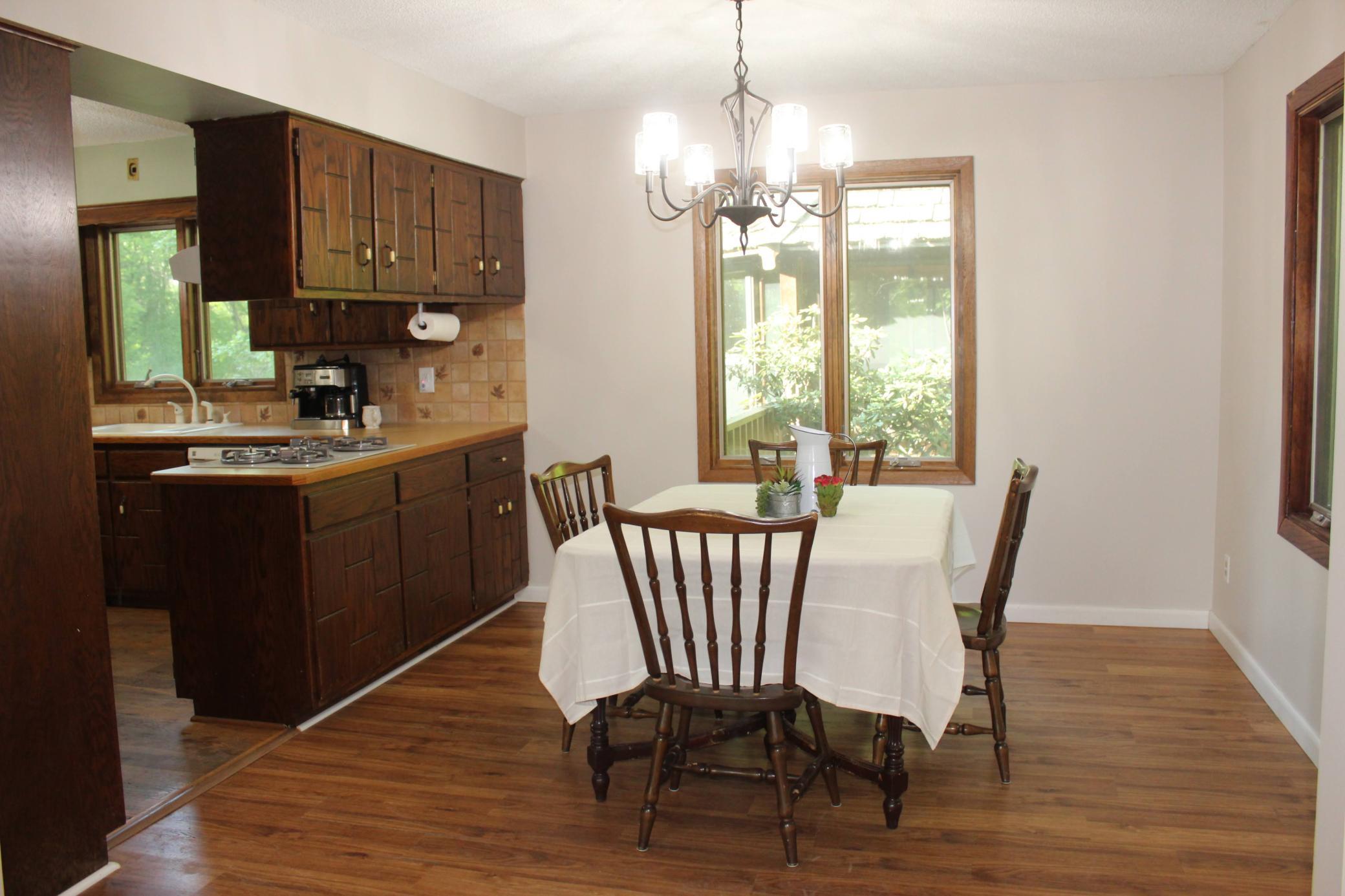 Dining Room with lots of windows.