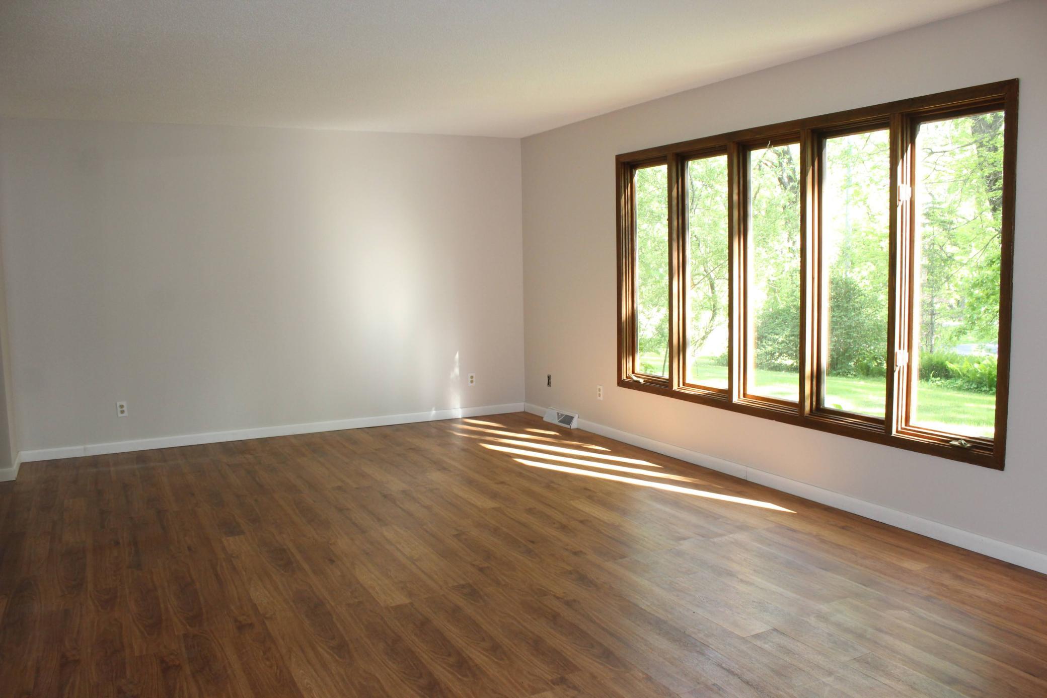 Newly painted Living Room, Dining Room, and Entry