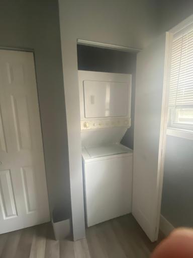 Stack-able washer and dryer in main floor bathroom