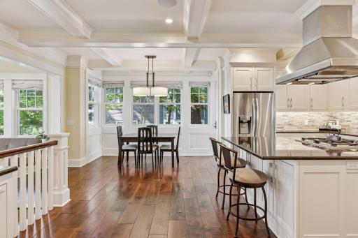 33x24 Fully Renovated Main Level Kitchen with new east, west and north-facing Marvin Ultimate wood windows, 8-inch solid walnut floors, custom enameled Danners cabinetry, coffered ceilings and mill work, Granite countertops and stainless appliances.
