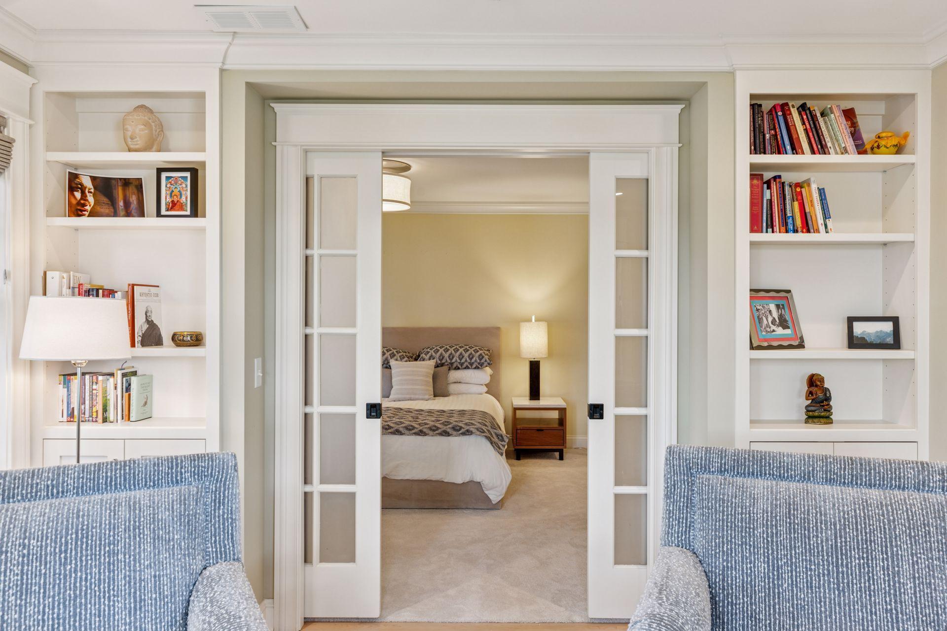 12x11 Fully renovated Primary bedroom-attached sitting room with Marvin Ultimate wood windows, custom enameled millwork and solid walnut floors West and north facing windows.