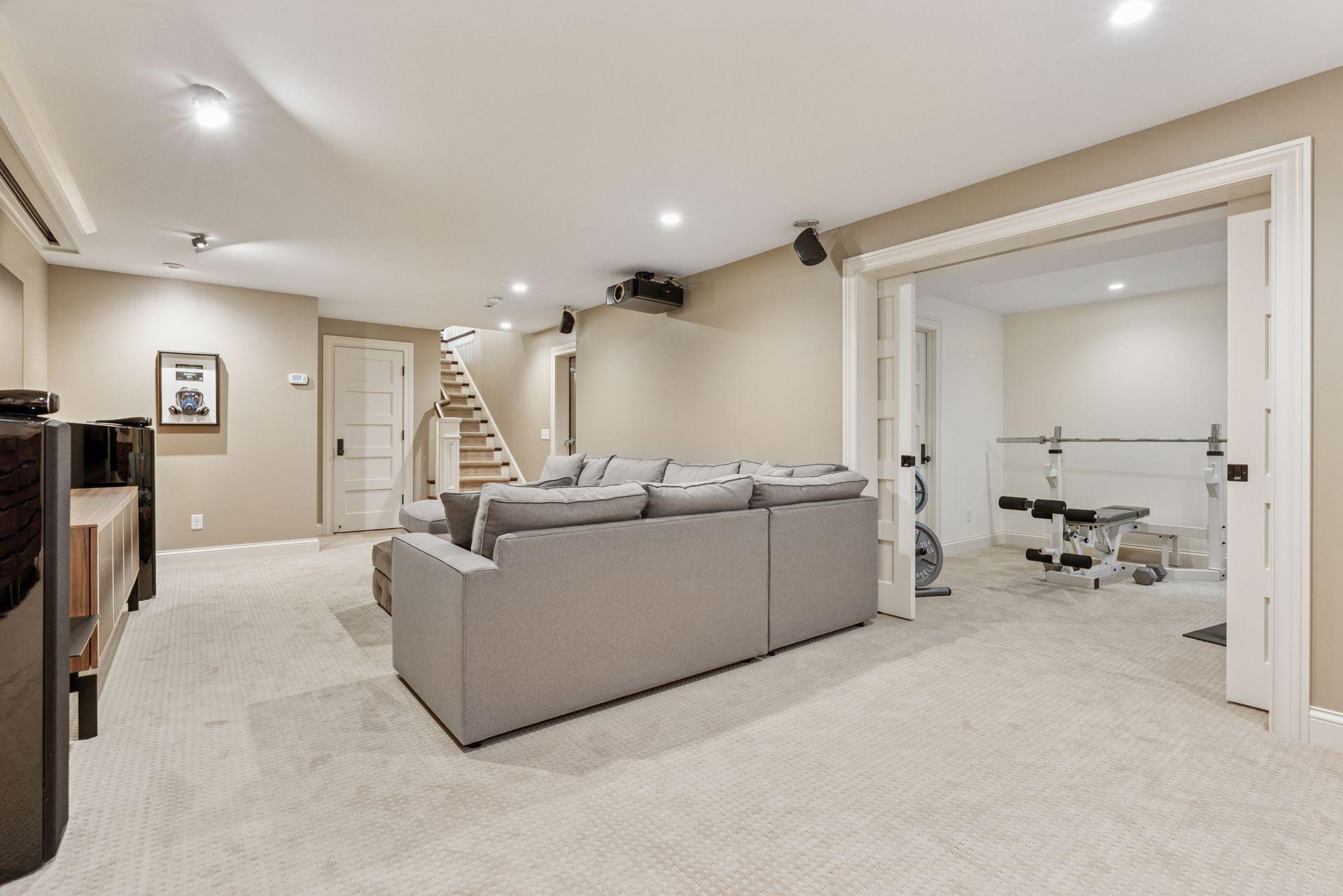 30x14 fully renovated lower-level Family room wired for sound and theater. The foundation was underpinned, and a new slab was poured, including drain tile.