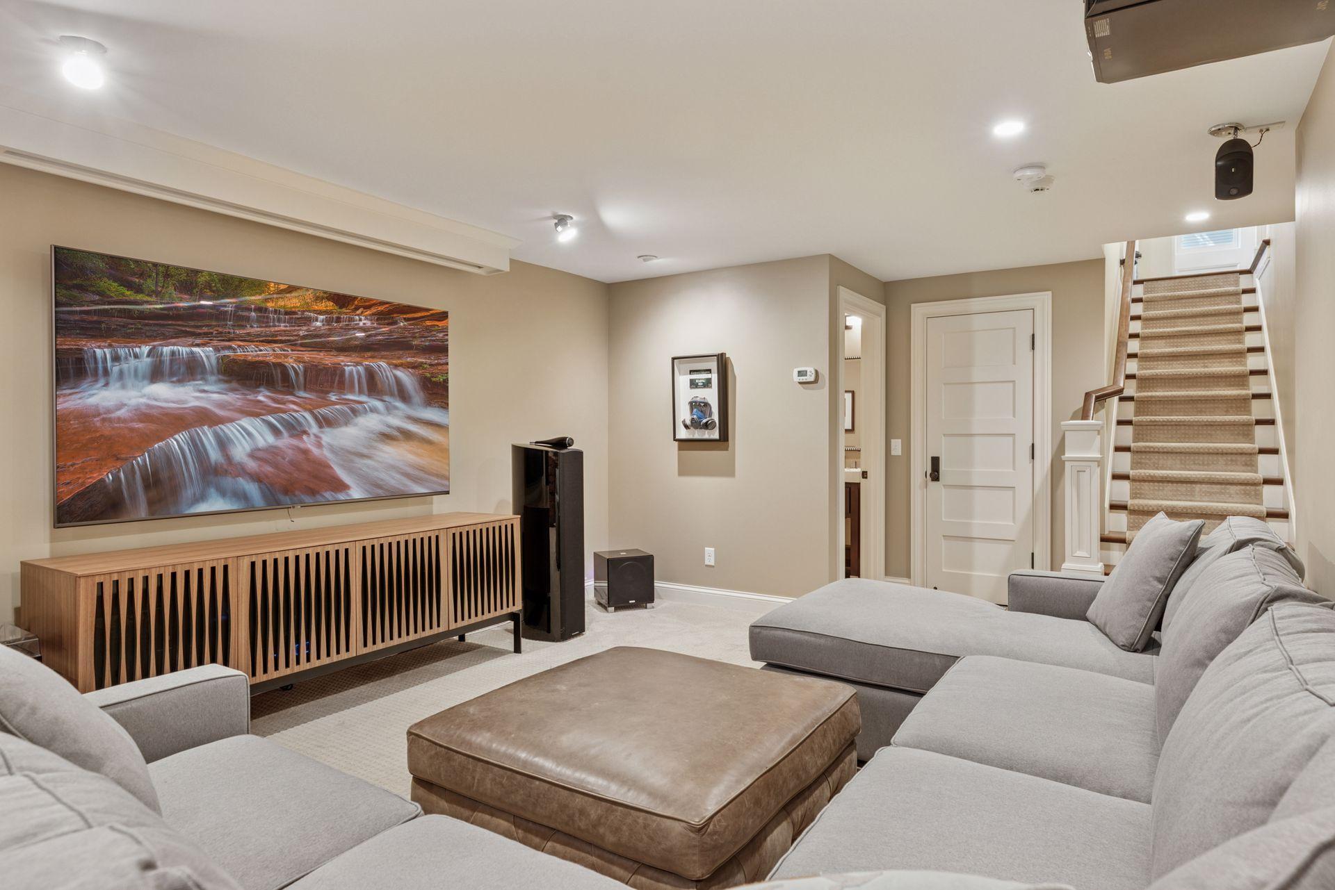 30x14 fully renovated lower-level Family room wired for sound and theater. The foundation was underpinned, and a new slab was poured, including drain tile.