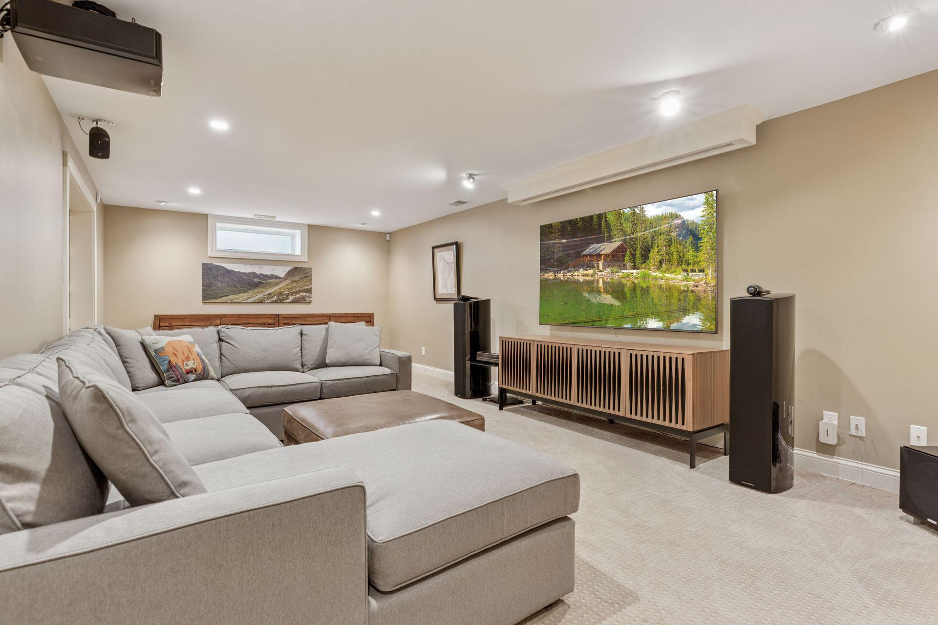 30x14 fully renovated lower-level Family room wired for sound and theater. The foundation was underpinned, and a new slab was poured, including drain tile.