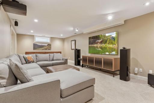 30x14 fully renovated lower-level Family room wired for sound and theater. The foundation was underpinned, and a new slab was poured, including drain tile.