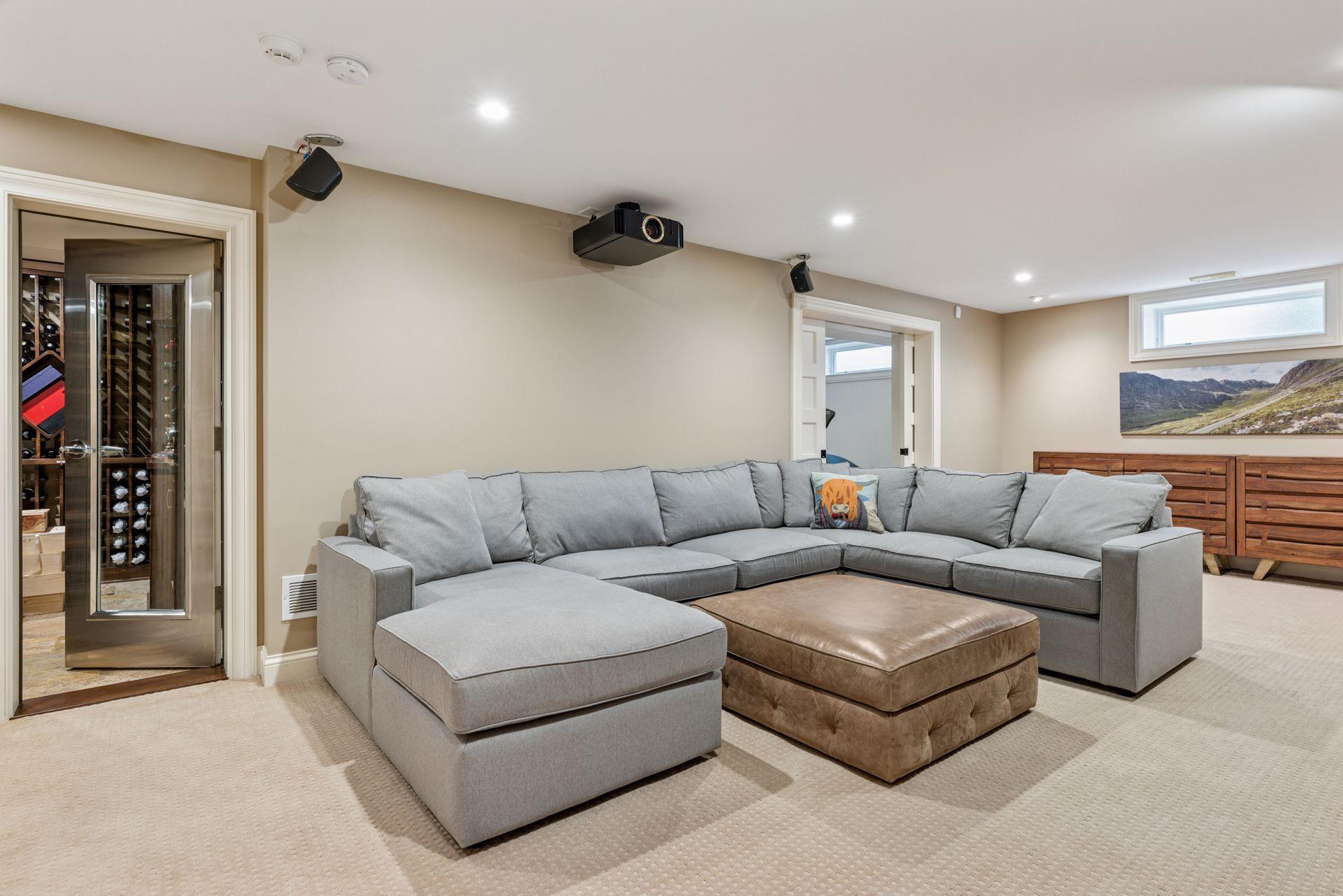 30x14 fully renovated lower-level Family room wired for sound and theater. The foundation was underpinned, and a new slab was poured, including drain tile.