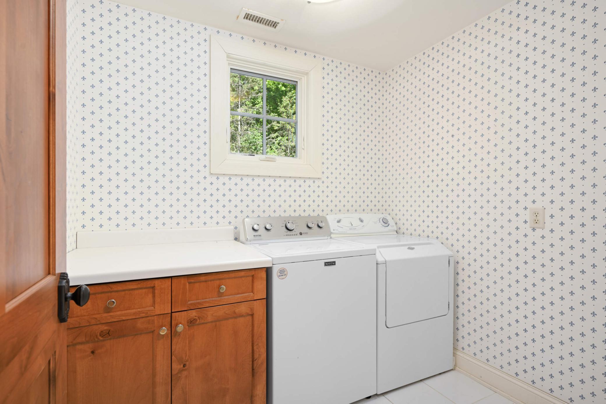 Main level laundry in guest house