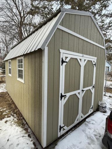 Large shed equipped with power and work benches