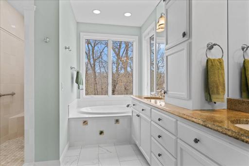 Granite counter-tops, walk-in shower and soaker tub.