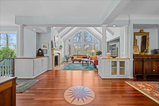 Cherry wood flooring throughout main level.