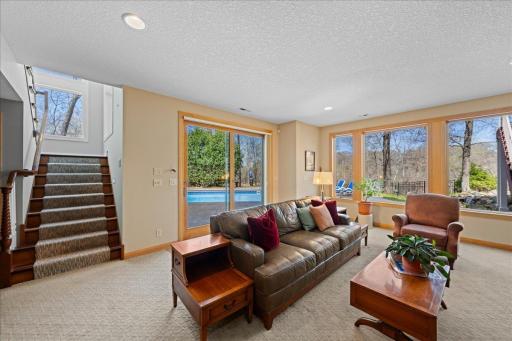 A plethora of windows letting the outside in and great view of pool/patio area.