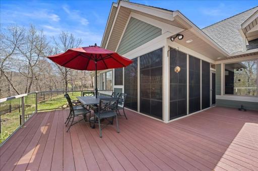 Enjoy hosting guests or your backyard nature from deck.