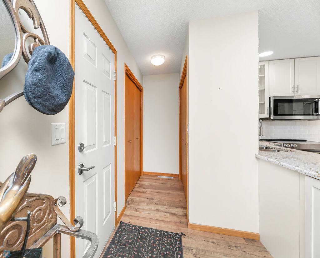 Garage entry offers lots of storage options