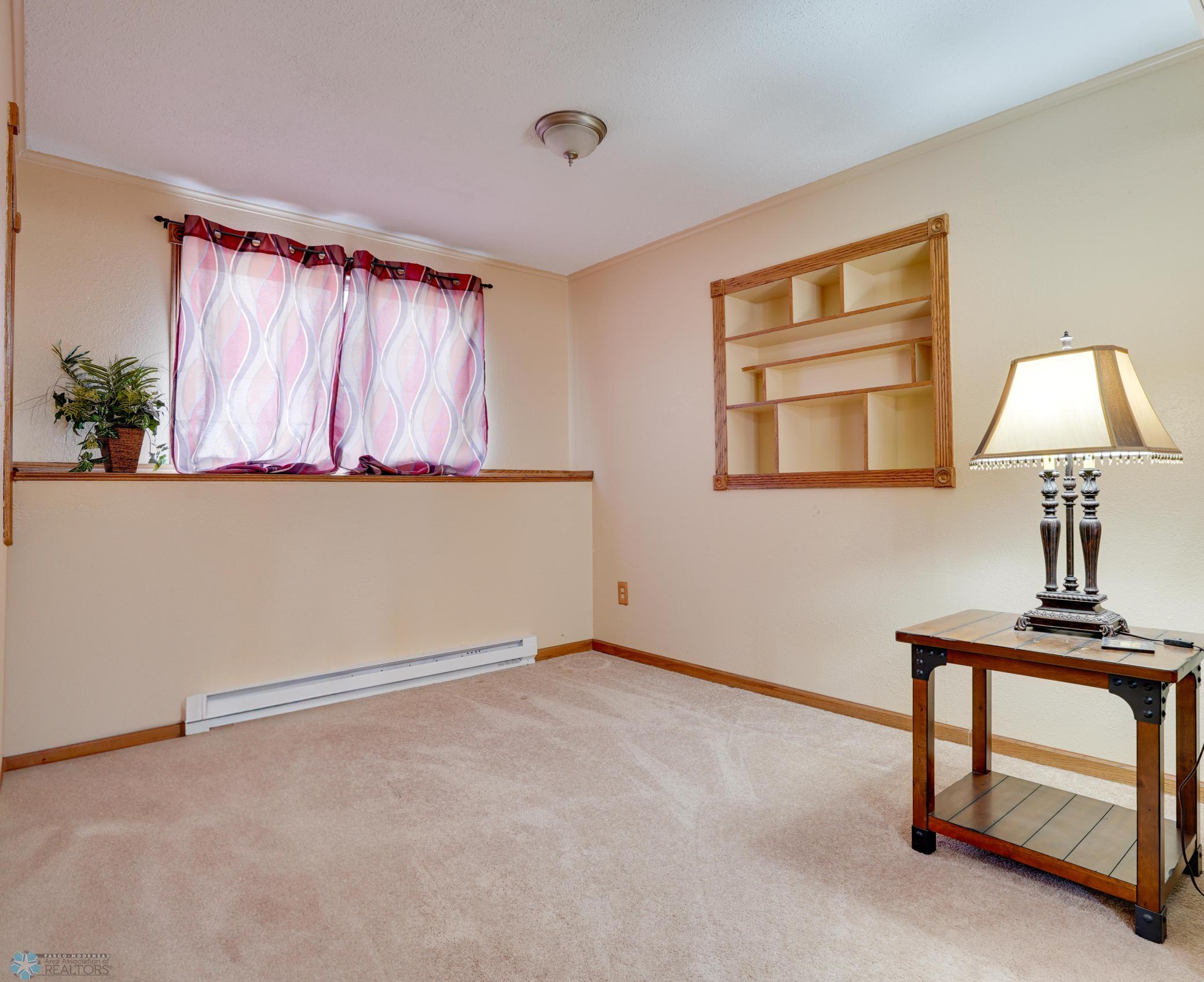 Family Room/Flex space. Customize with an office, playroom, guest bed, crafting, etc.