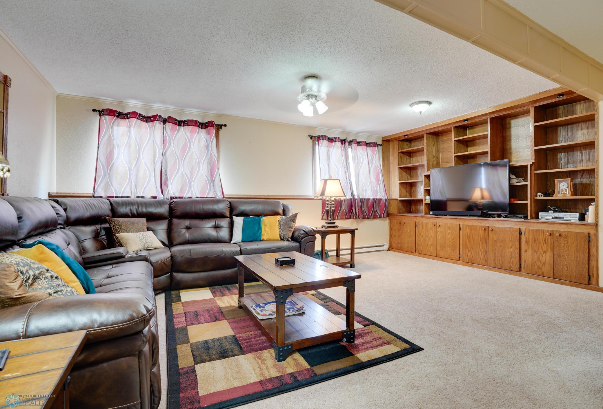 Family Room offers built-ins for lots of storage!