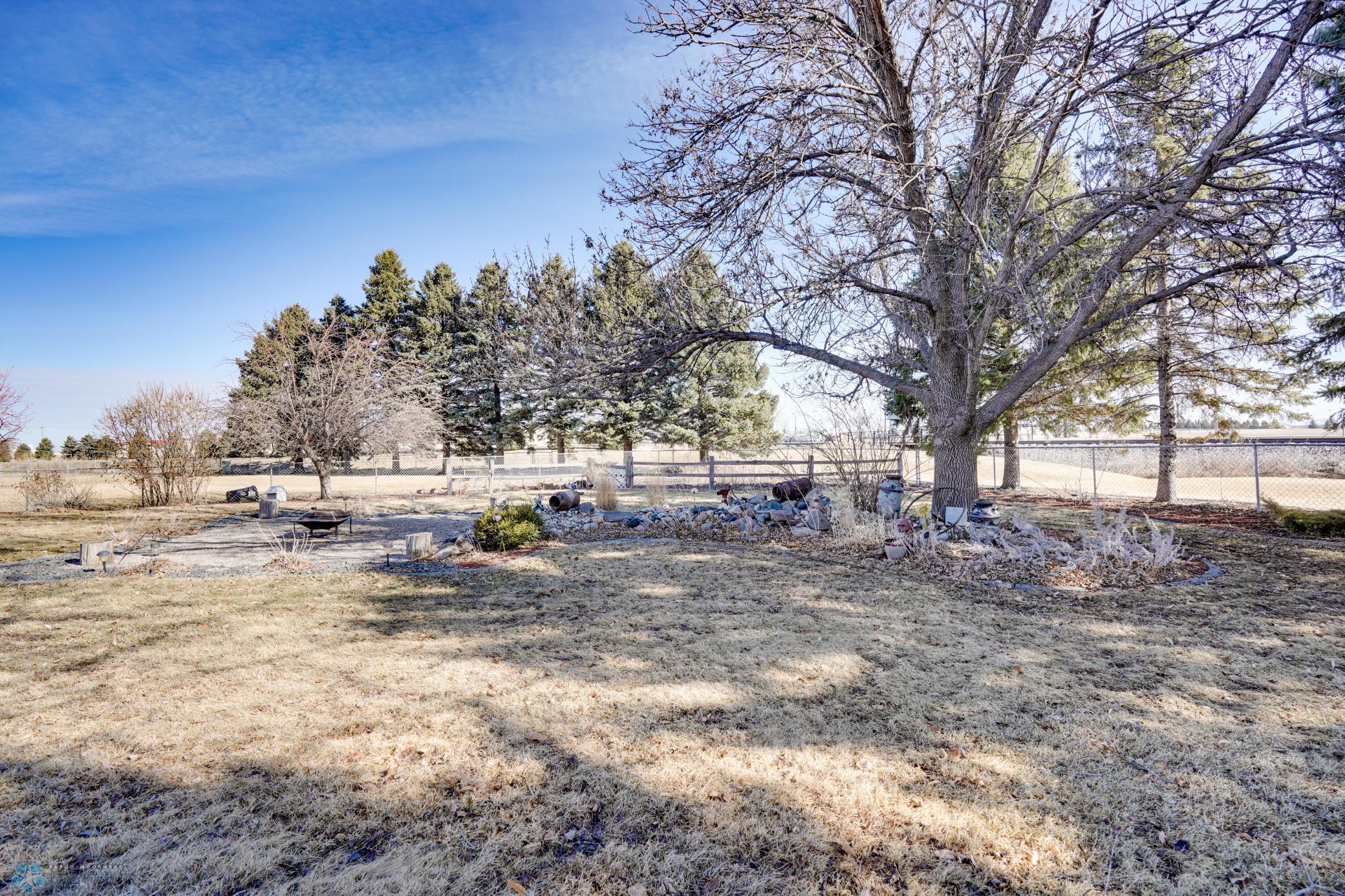 Huge, landscaped backyard, fully fenced.