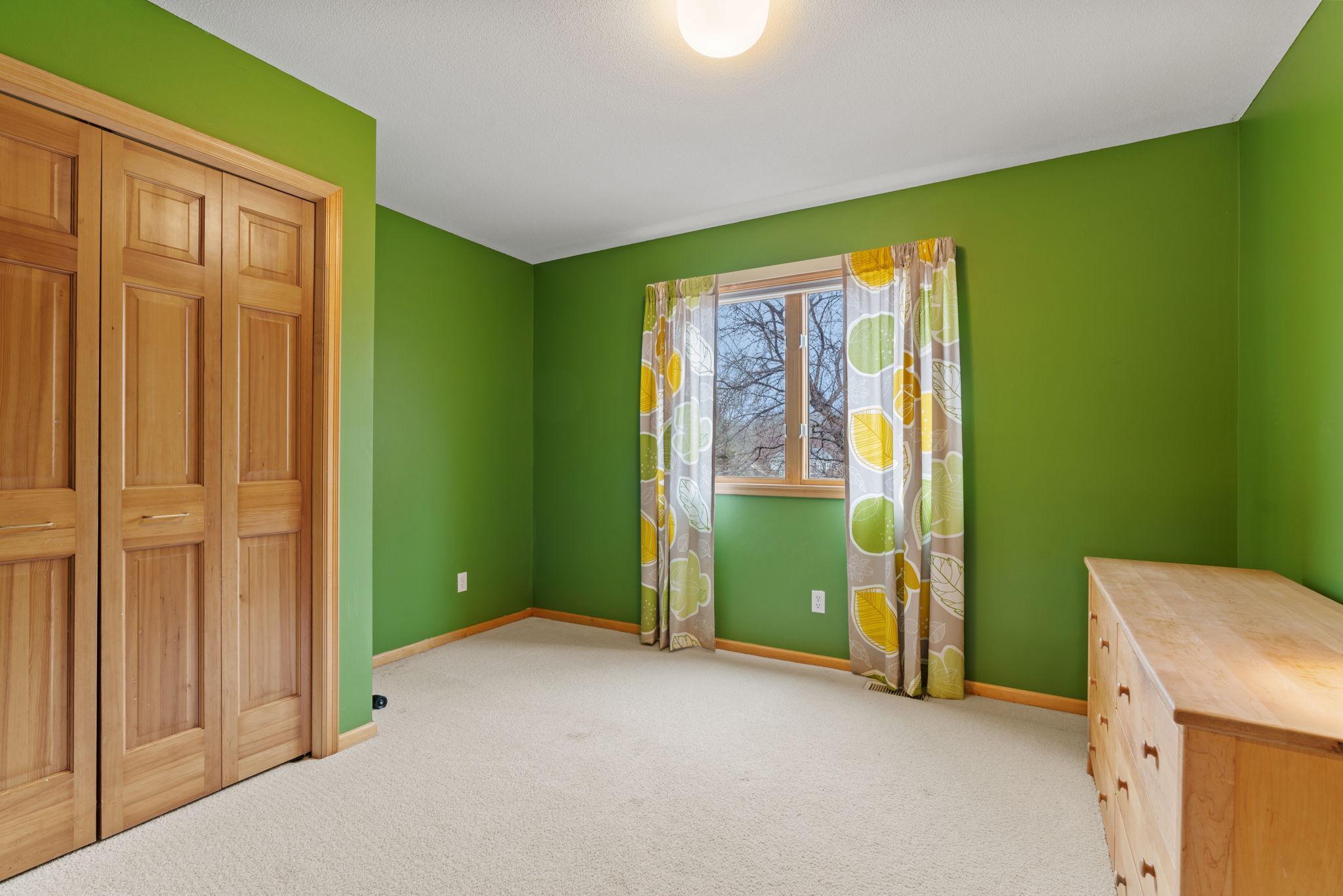 Third upper level bedroom.
