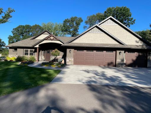 7977 River Rd NE, Rice - 3 BR, 3BA, 3Stall Executive Patio Home