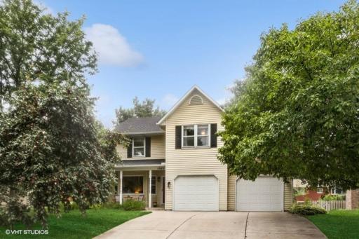 This home has great street appeal with Vinyl siding, shutters, concrete driveway.