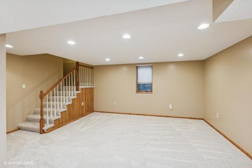 Spacious lower level family room w/egress window