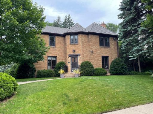 Beautiful two story brick home in a fabulous location across the street from Triangle Park and just west of Lake Nokomis