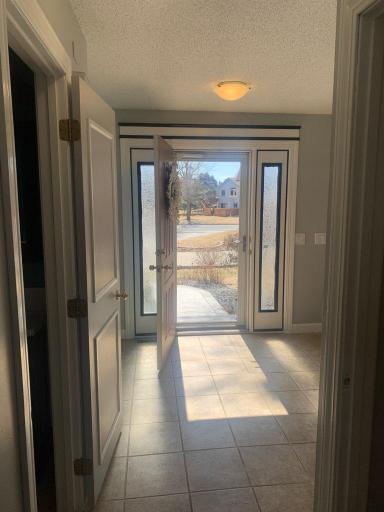 Front door with sidelights, nice sized entry