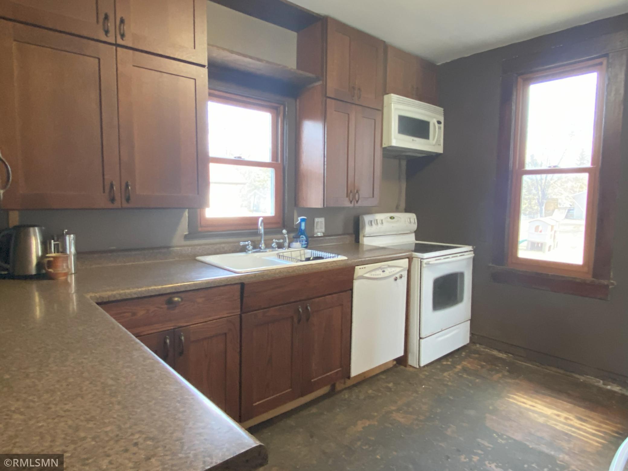 Kitchen has many new cabinets