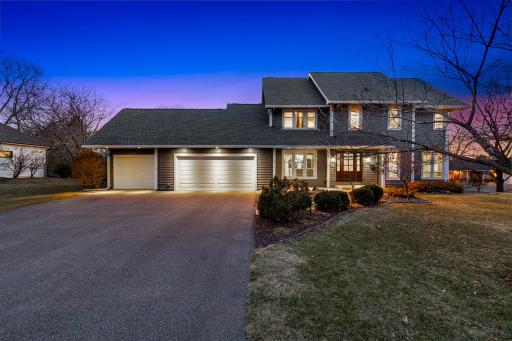 The home is set on a premium, 2/3 of an acre lot in a quiet, mature, walkable neighborhood, one minute from 35E.