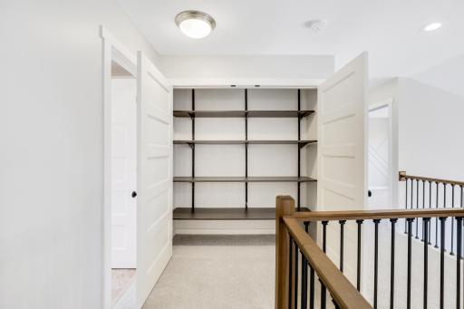The convenient, upper-level hall closet provides ample storage.