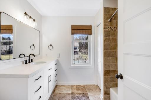 This full bathroom serves the 2 upper-level kids rooms.