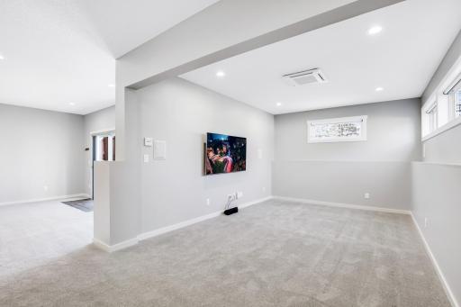 The TV den features built-in surround speakers and noise cancelling insulation was thoughtfully included.