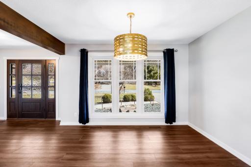 The dining room is bright and open to the kitchen, foyer and spacious living room.
