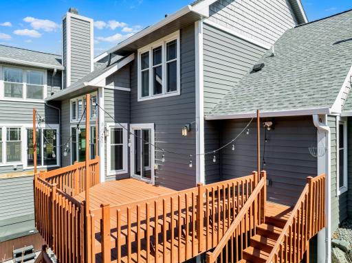 The beautiful paver patio and spacious deck are perfect for entertaining.