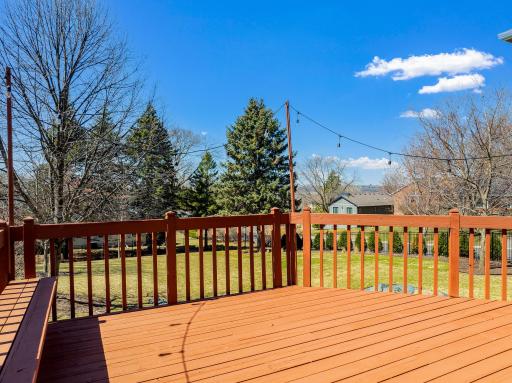 The beautiful paver patio and spacious deck are perfect for entertaining.