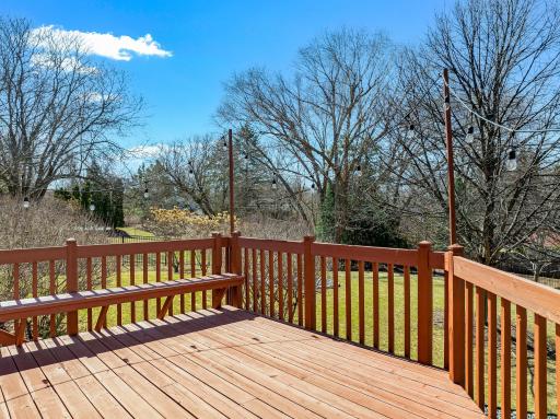 The beautiful paver patio and spacious deck are perfect for entertaining.