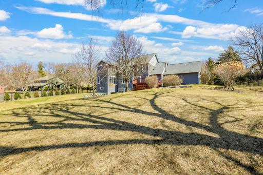 The backyard is massive and ready for outdoor activities.