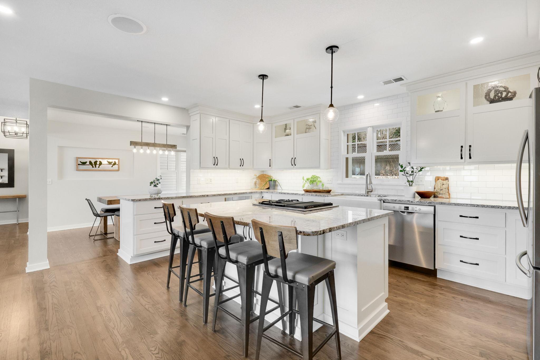 Large center island, gas range, updated lighting