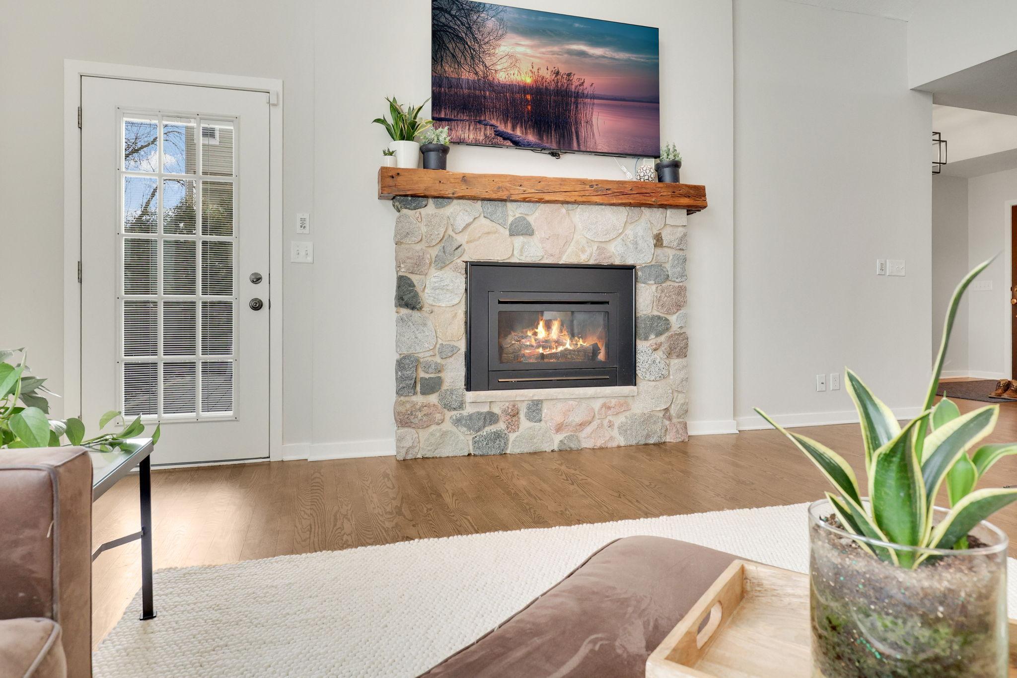 Great room gas fireplace with stone surround