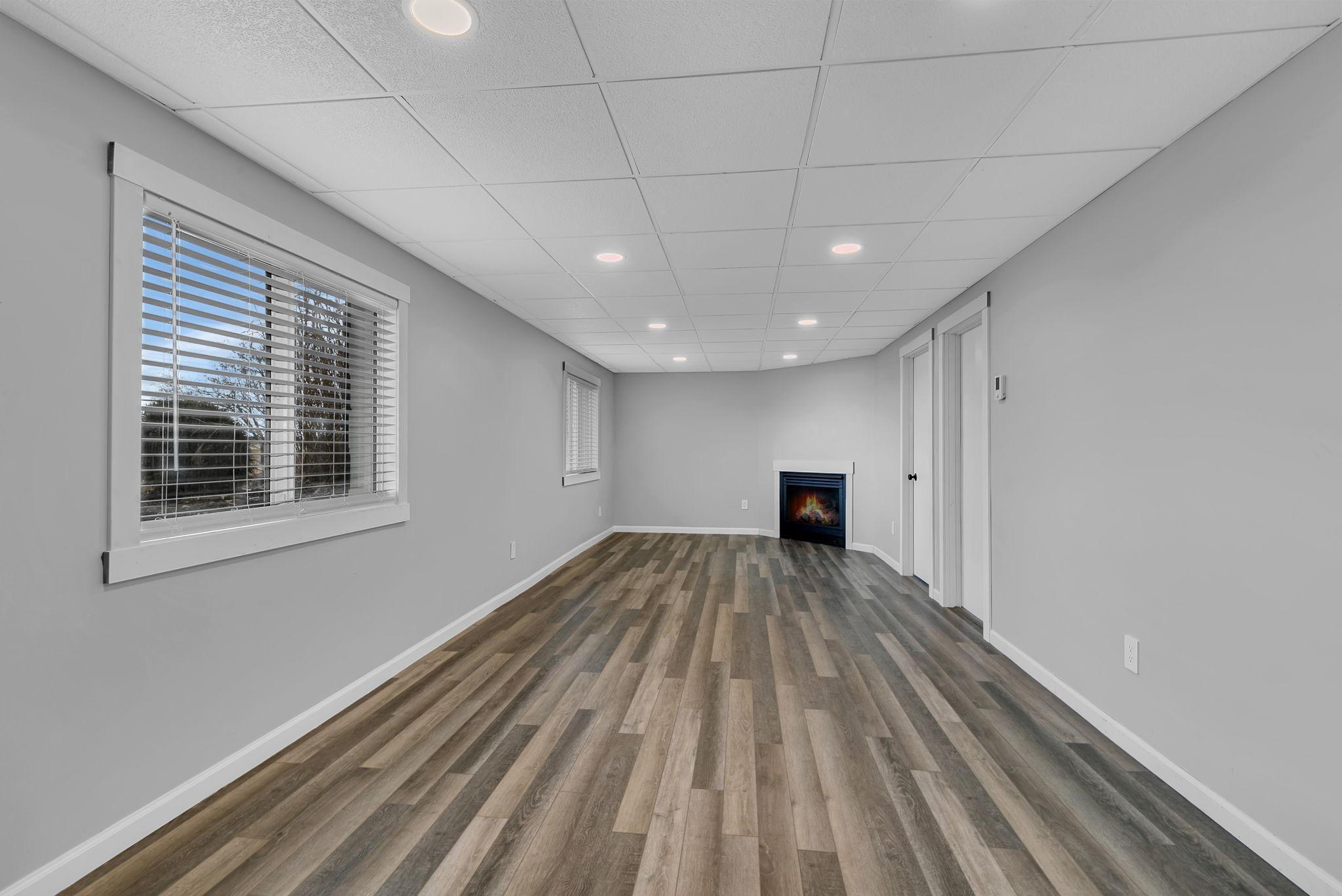 Lower Level Living Room with gas fireplace