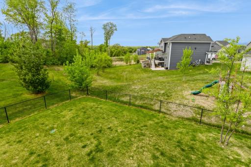 Fully fenced backyard perfect for kids and pets to run and play!