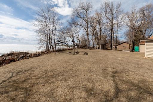 Spacious yard for outdoor fun and games between the cabin and the lake