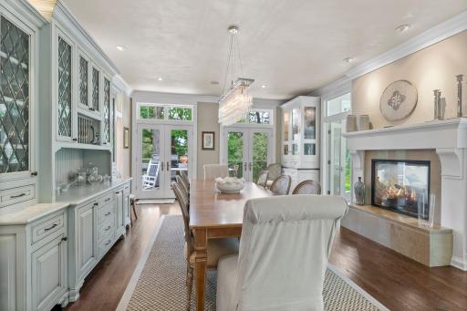 Lovely dining space that enjoys natural light and the glittering chandelier!